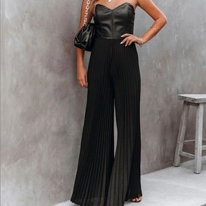 Black faux leather & pleat jumpsuit. NWOT. Never worn!